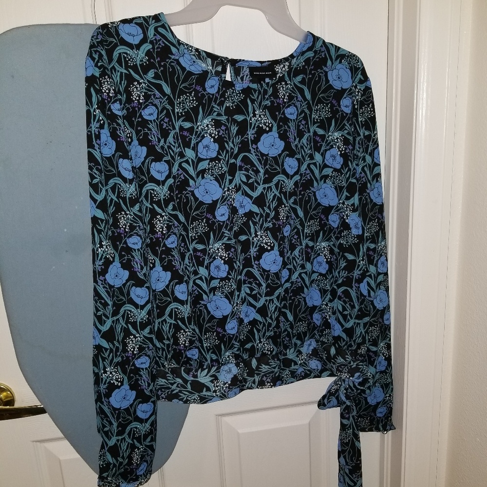 Long sleeve blouse with tie bottom